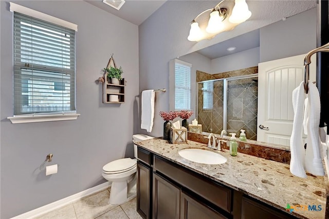 834 Oyster Crk, Buda, TX 78610 - full bathroom featuring vanity, tile patterned flooring, and a stall shower