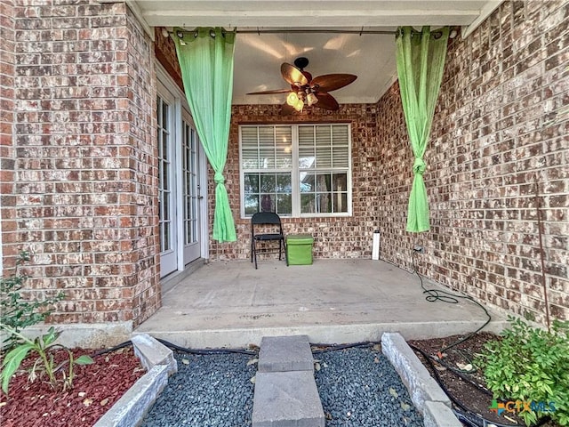 view of patio with ceiling fan