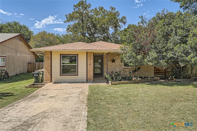 view of front of home with a front yard