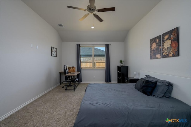 carpeted bedroom with lofted ceiling, a ceiling fan, visible vents, and baseboards