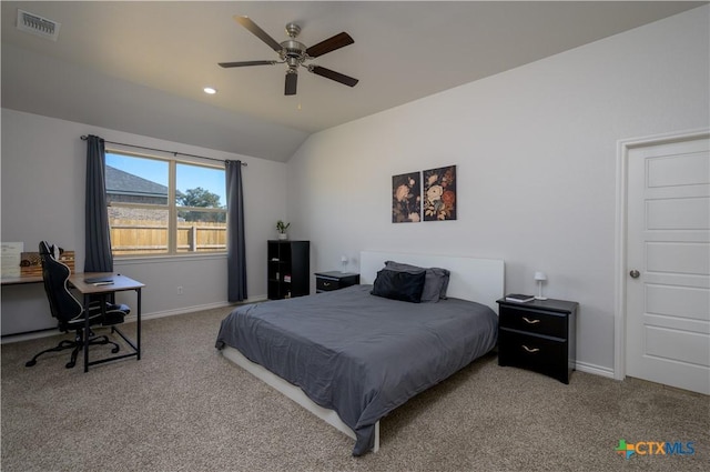 bedroom featuring vaulted ceiling, carpet flooring, and baseboards