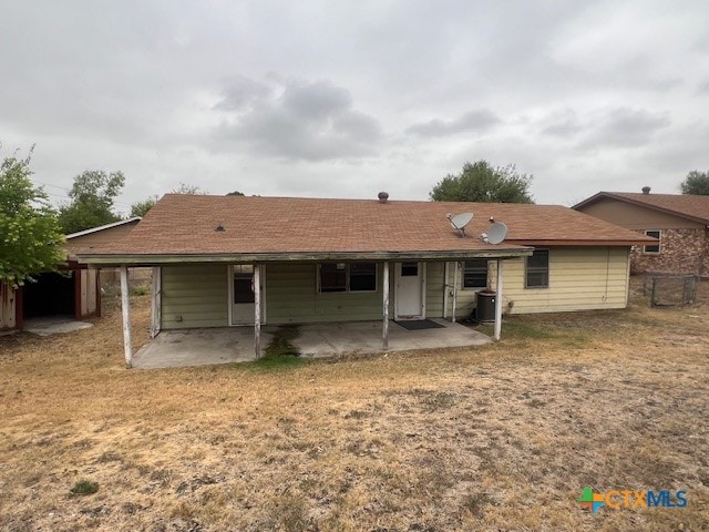 rear view of property with a patio