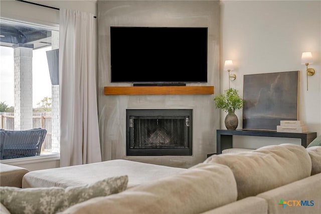 bedroom featuring a fireplace