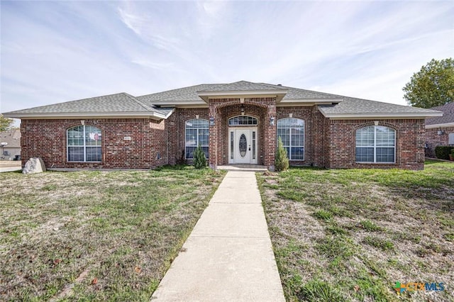 view of front of home with a front yard