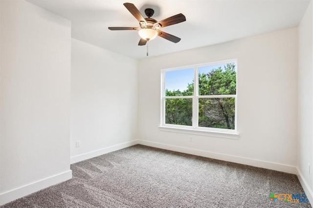 carpeted empty room with ceiling fan