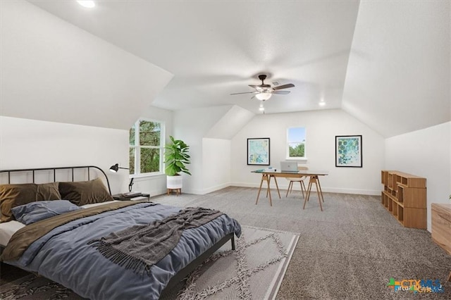 carpeted bedroom with ceiling fan and lofted ceiling