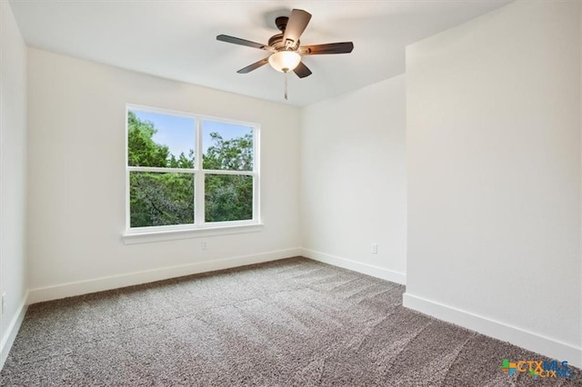 empty room featuring ceiling fan and carpet floors