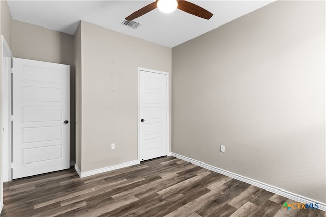 7713 Purvis St, Temple, TX 76502 - unfurnished bedroom featuring dark wood-style floors, baseboards, and ceiling fan