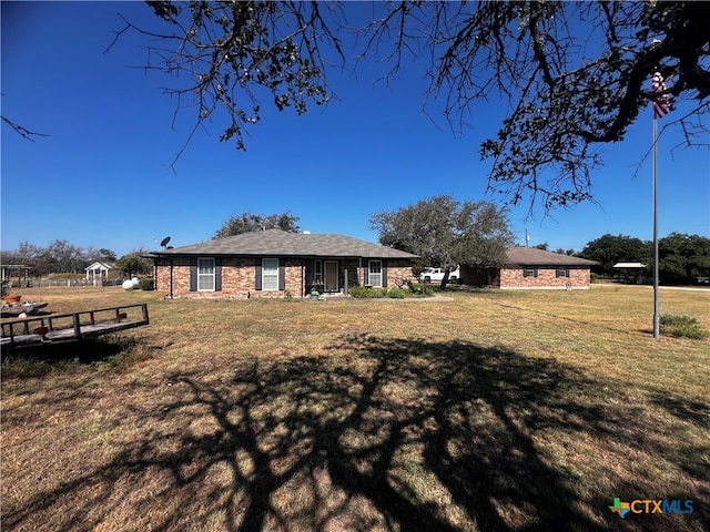 exterior space with a front yard