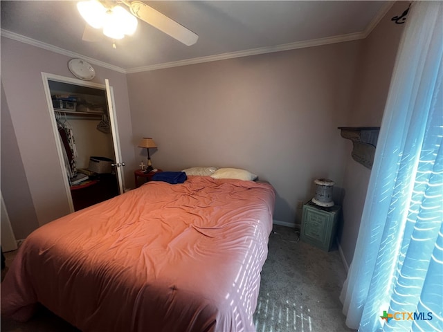 bedroom with ornamental molding, carpet, ceiling fan, and a closet