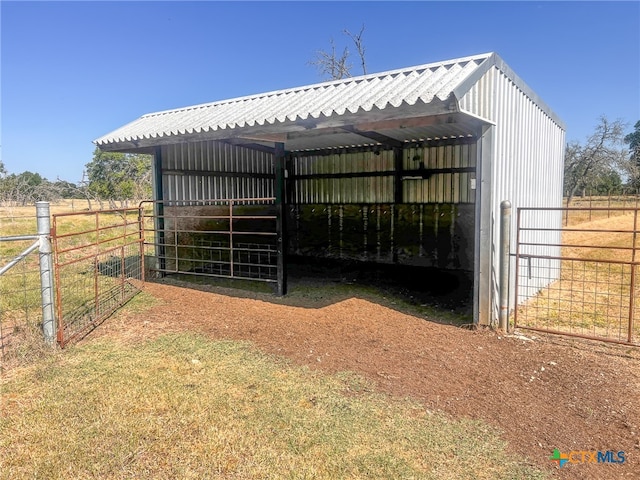 view of outdoor structure featuring a rural view