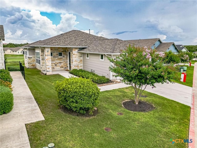 117 Ace Ln Unit 101, San Marcos, TX 78666 - view of front of property featuring stone siding and roof with shingles