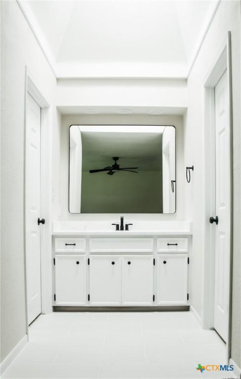 211 Alamogordo Dr, Victoria, TX 77904 - corridor with a sink and baseboards