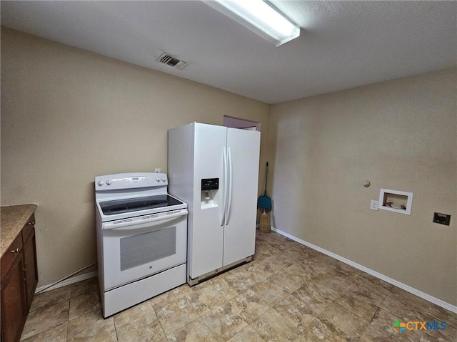 kitchen featuring white appliances