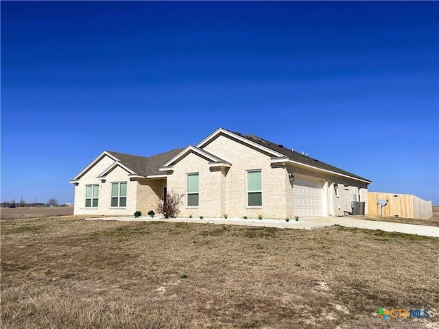 single story home with a garage