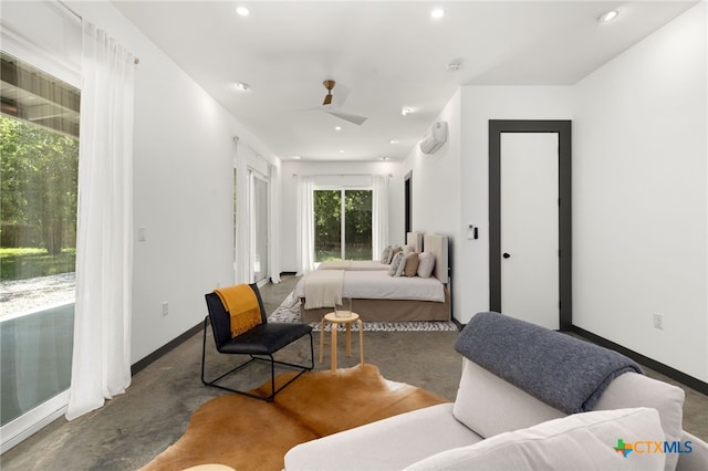 105 Schroeder St, Lockhart, TX 78644 - bedroom featuring baseboards, concrete floors, access to outside, and recessed lighting