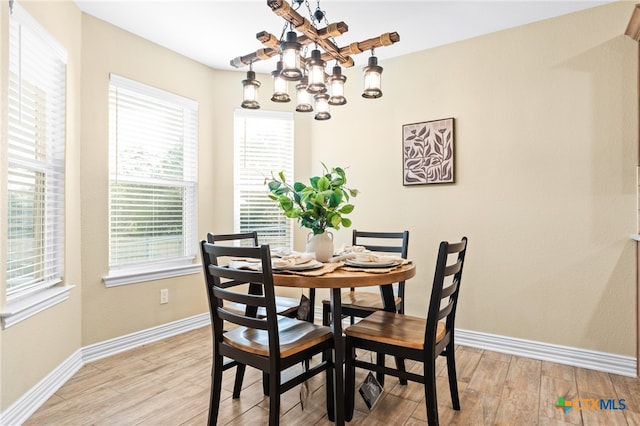 dining area with light wood-type flooring