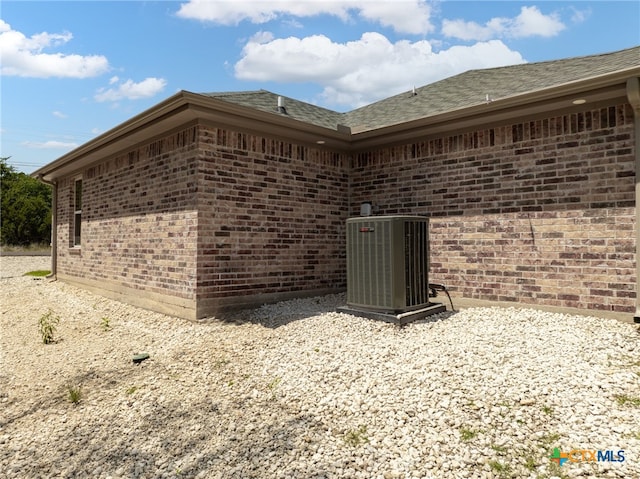 view of home's exterior featuring central AC