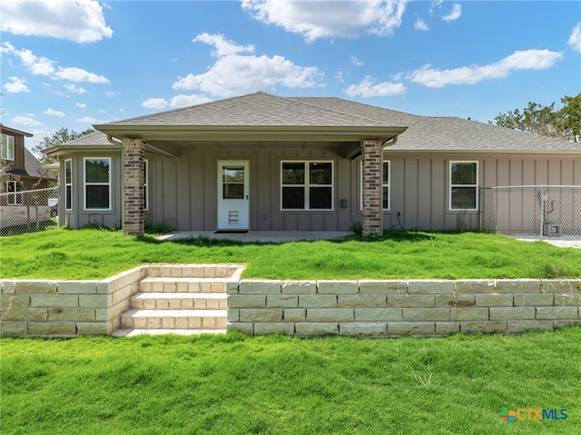 view of front of home with a front yard