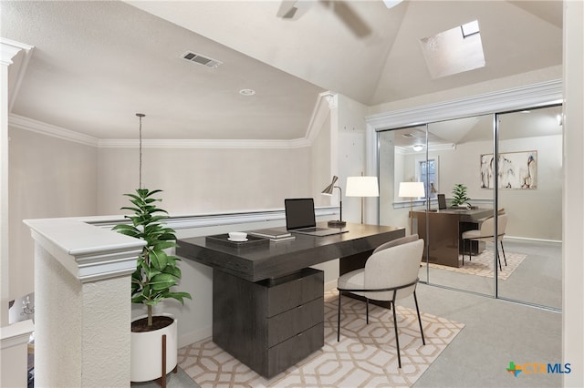 home office with lofted ceiling and crown molding