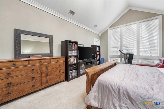 bedroom with ornamental molding, light colored carpet, and lofted ceiling