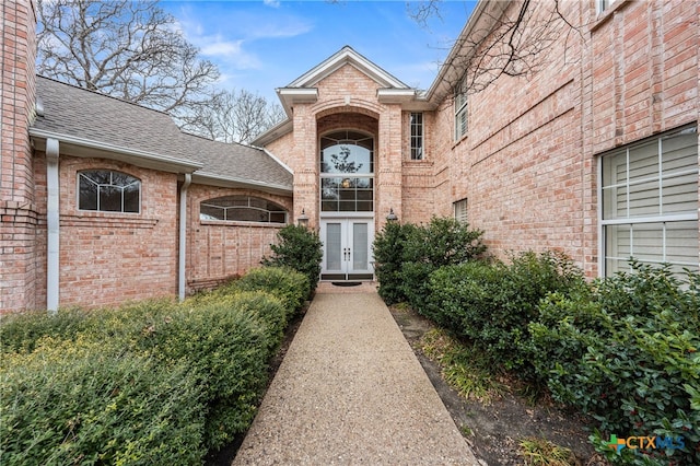 property entrance featuring french doors