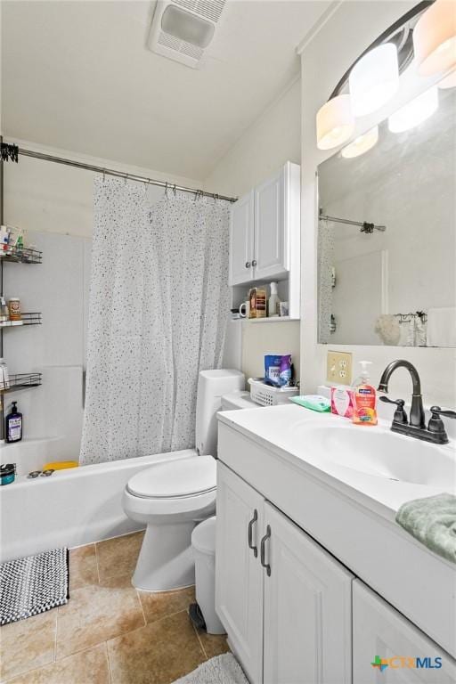 bathroom with visible vents, toilet, tile patterned floors, shower / bath combination with curtain, and vanity