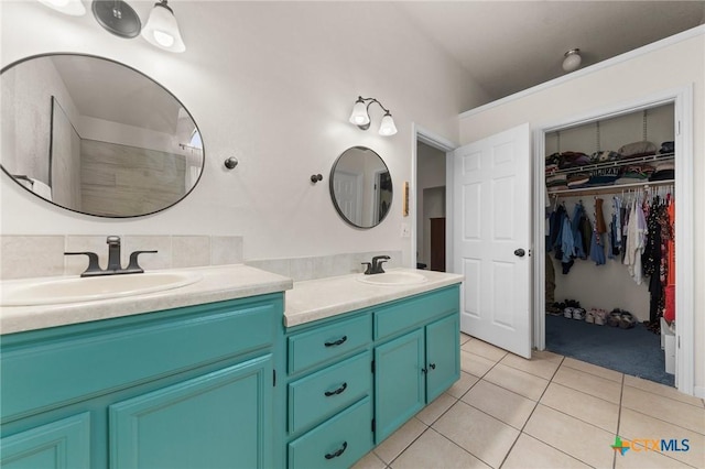 bathroom with vanity and tile patterned floors