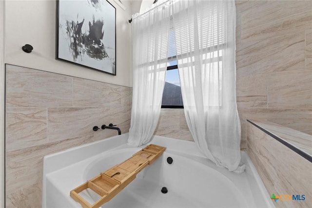 bathroom with washtub / shower combination