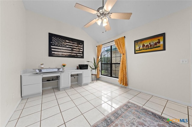 tiled office featuring vaulted ceiling and ceiling fan