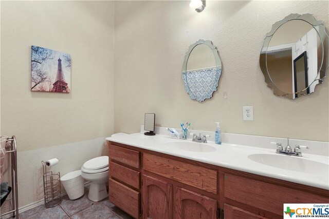 1074 Fm 3219, Harker Heights, TX 76548 - full bath with double vanity, toilet, and tile patterned floors