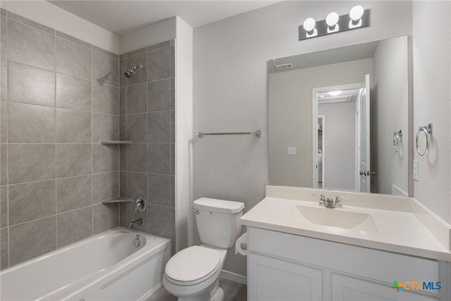 bathroom with toilet, shower / bath combination, and vanity