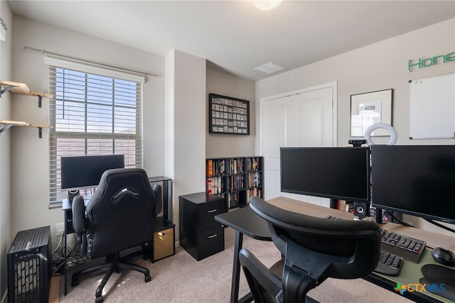 office with visible vents and light colored carpet