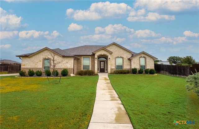 view of front facade with a front lawn