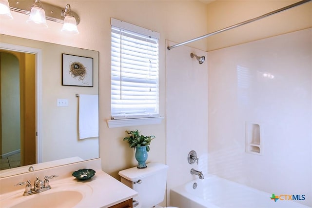 full bathroom featuring vanity, shower / bathing tub combination, and toilet