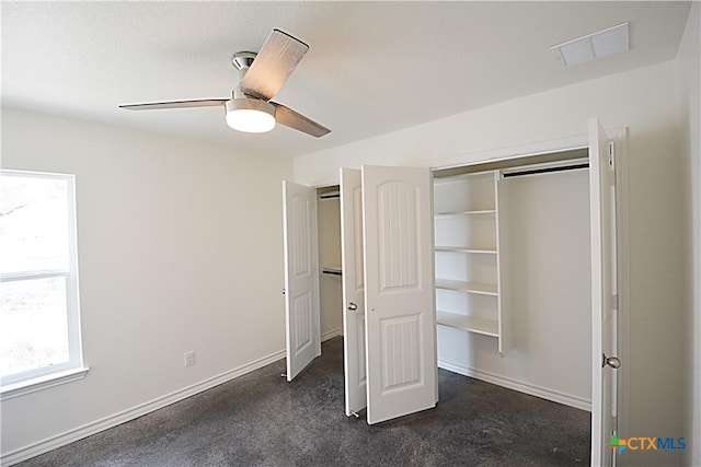 unfurnished bedroom featuring a closet and ceiling fan