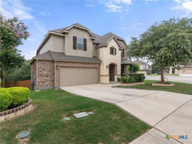 515 Secluded Grv, San Antonio, TX 78253 - view of front of home featuring driveway, a garage, roof with shingles, stucco siding, and brick siding