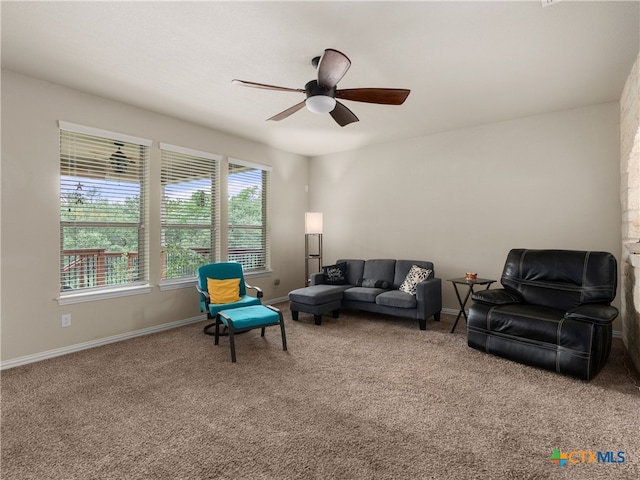 515 Secluded Grv, San Antonio, TX 78253 - living room featuring carpet floors, a ceiling fan, and baseboards