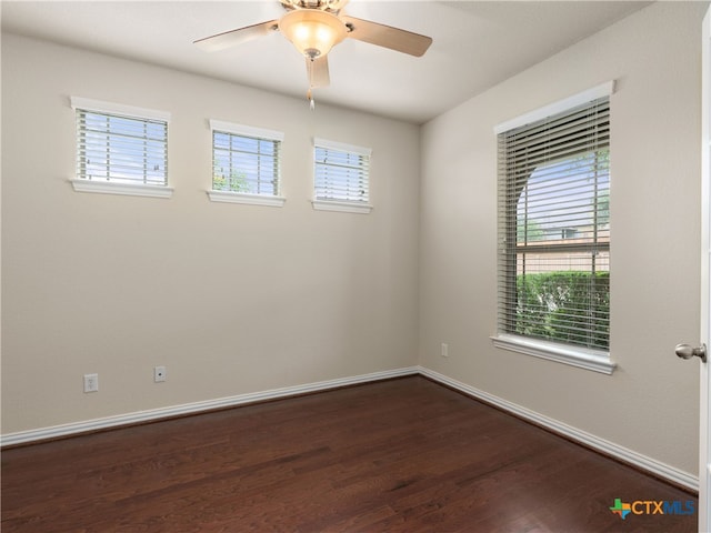 515 Secluded Grv, San Antonio, TX 78253 - empty room featuring plenty of natural light, dark wood finished floors, and baseboards