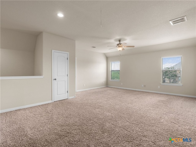 515 Secluded Grv, San Antonio, TX 78253 - carpeted spare room featuring ceiling fan, baseboards, a textured ceiling, and recessed lighting