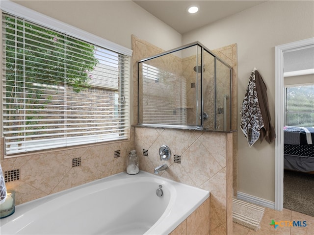 515 Secluded Grv, San Antonio, TX 78253 - ensuite bathroom featuring a bath, a stall shower, tile patterned flooring, and recessed lighting