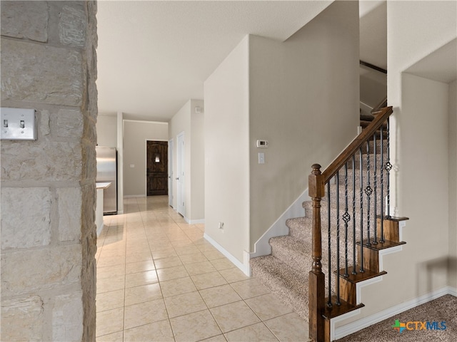 515 Secluded Grv, San Antonio, TX 78253 - stairway featuring tile patterned flooring and baseboards