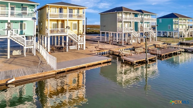 dock area featuring a water view