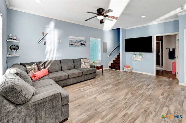 52 Fm 2031, Matagorda, TX 77457 - living room with wood finished floors, crown molding, stairway, a ceiling fan, and recessed lighting