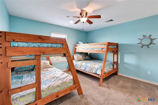 52 Fm 2031, Matagorda, TX 77457 - bedroom featuring carpet, baseboards, and a ceiling fan