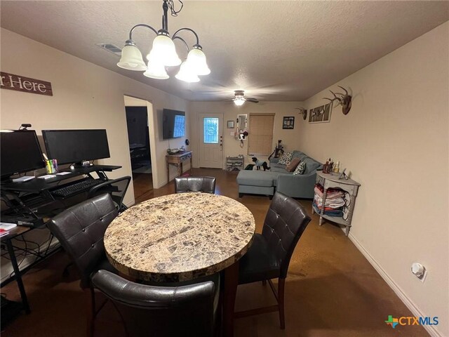 801AND803 S Live Oak St, Lampasas, TX 76550 - dining room with a chandelier, a textured ceiling, and ceiling fan