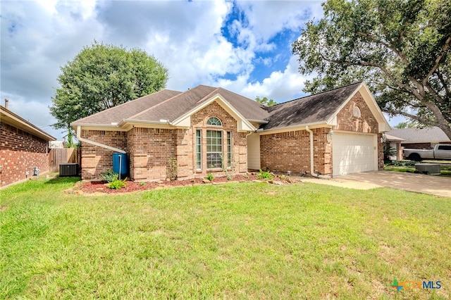 ranch-style home featuring a front lawn, a garage, and central AC