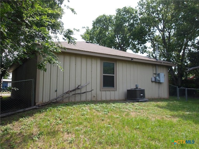2807 Terrace Dr, Killeen, TX 76543 - back of property with central air condition unit and board and batten siding