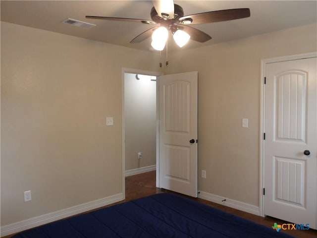 2807 Terrace Dr, Killeen, TX 76543 - unfurnished bedroom featuring a ceiling fan and baseboards