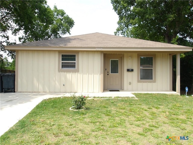 2807 Terrace Dr, Killeen, TX 76543 - single story home with a front lawn, a shingled roof, and board and batten siding